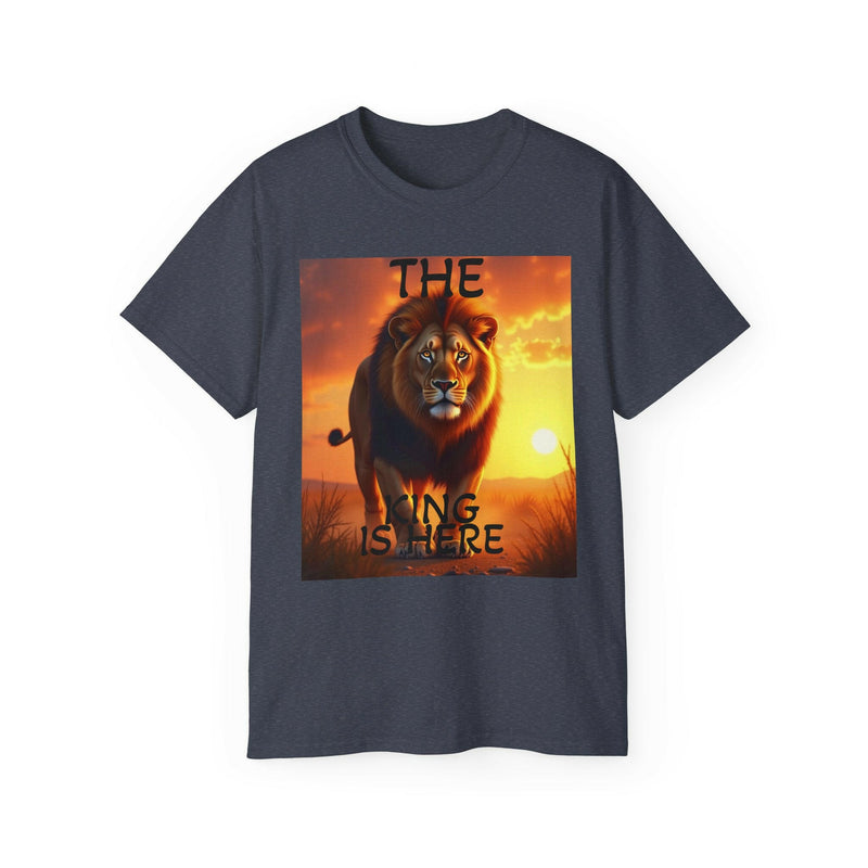 Unisex navy cotton tee with vibrant lion graphic and text "The king is here" at sunset background, casual and comfortable design