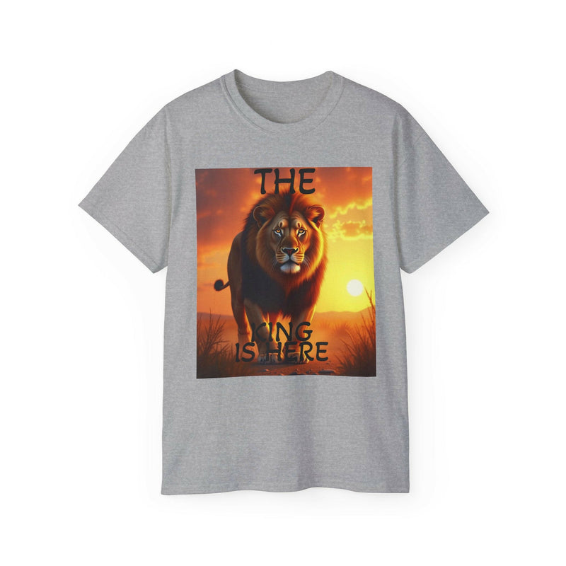 Gray unisex ultra cotton tee featuring a bold lion graphic with sunset background and "The King is Here" text.