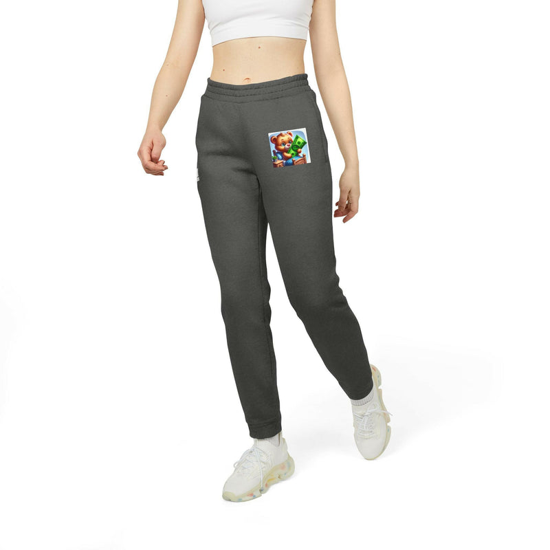 Cozy unisex fleece joggers in dark gray with elastic waistband, cuffed hems, and colorful patch detail, styled for casual and athletic wear.