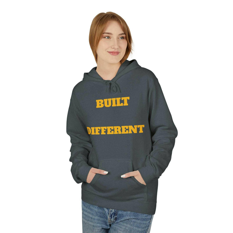 Unisex dark gray casual hoodie with "Built Different" text in yellow, soft fleece, relaxed fit, pouch pocket, and 2-piece hood.