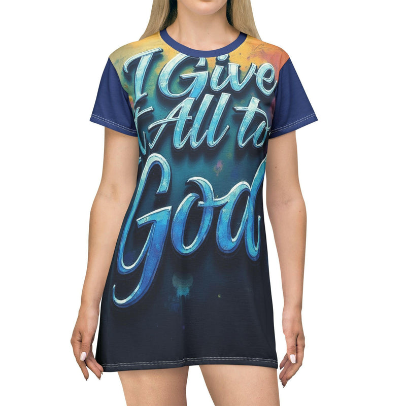 Woman wearing a colorful "I Give It All to God" inspirational T-shirt dress with short sleeves and a round neckline.