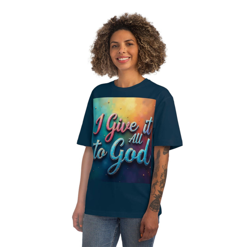 Woman wearing a navy Inspirational Unisex Fuser T-Shirt with "I Give it All to God" colorful text design