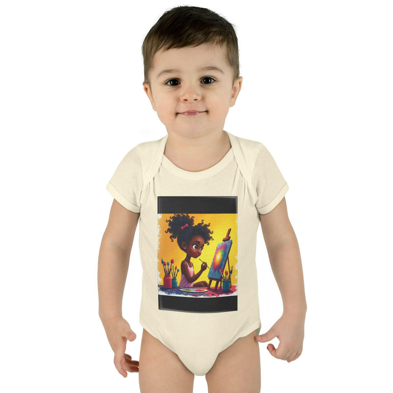 Infant wearing cream baby bodysuit with colorful artistic painting print, comfortable unisex romper for toddlers.