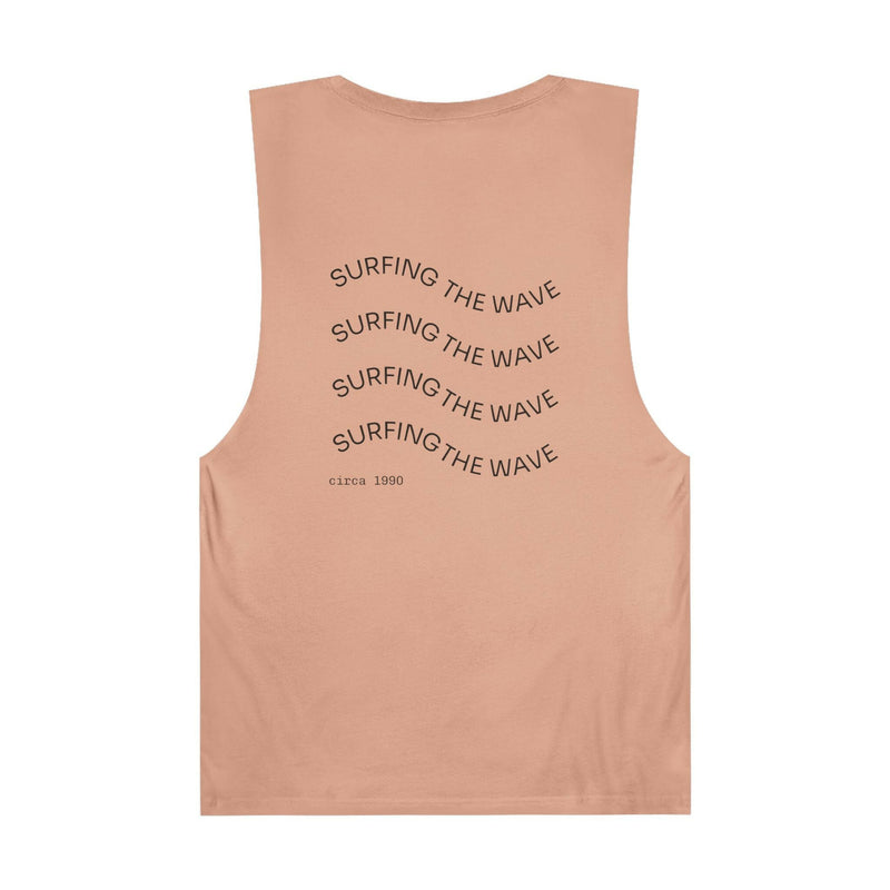 Unisex graphic tank top in peach with "Surfing The Wave" text design for casual summer wear and beach vibes