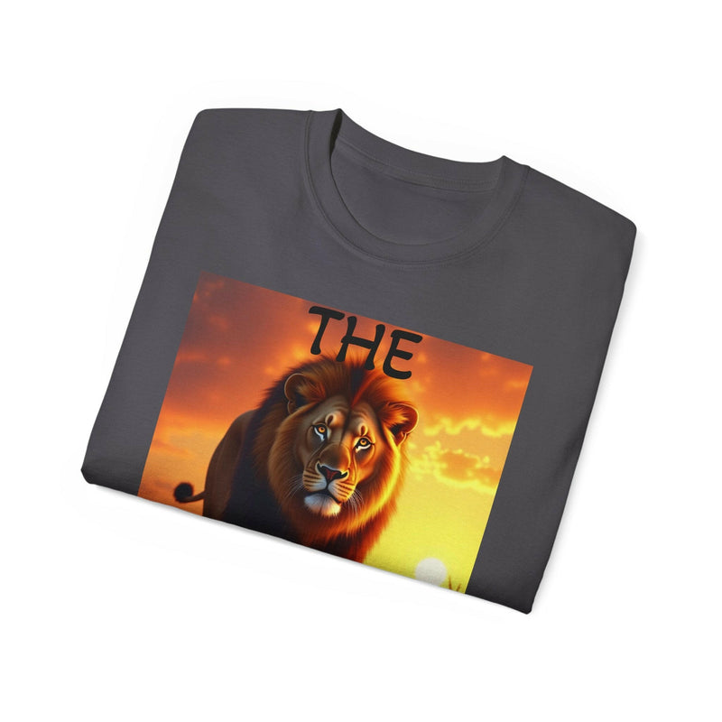 Folded dark gray unisex ultra cotton tee featuring a vibrant lion graphic with a sunset background and the word "THE" above the lion's head.