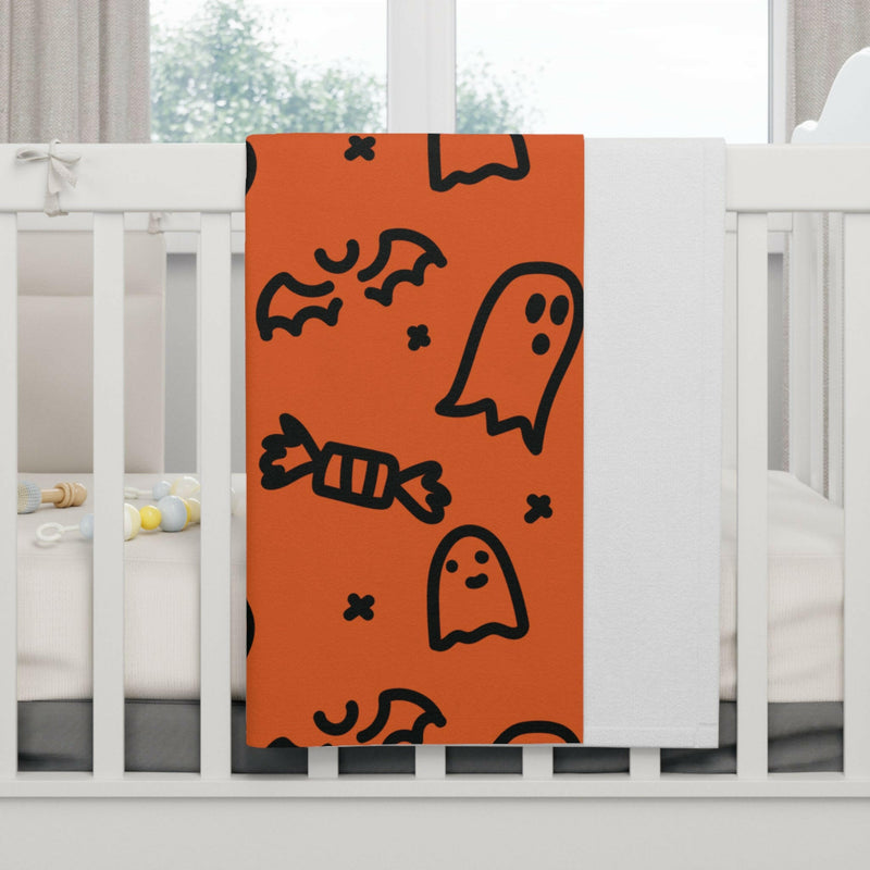 Halloween-themed baby blanket featuring festive designs perfect for cozy seasonal comfort